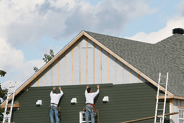 Professional Siding Installation technician working in West Point, GA